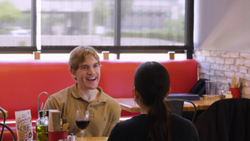 Sauce Pizza and Wine diners talking